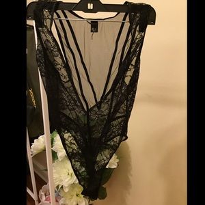 Black lacy Victoria's Secret body suit